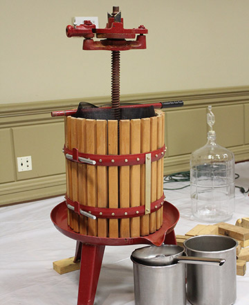 Wooden basket press.