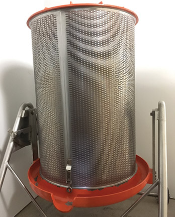 Stainless steel bladder press.