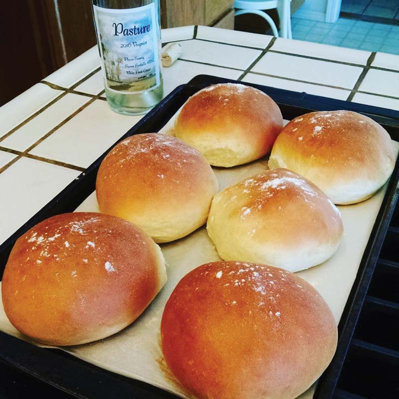 homemade hamburger buns paired with a bottle of viognier wine