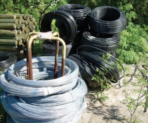 A collection of supplies needed to establish a vineyard with drip irrigation system